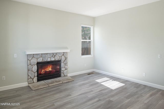 4734 Tierrapark Ct, Reno, NV 89502 - unfurnished living room featuring a fireplace and wood finished floors