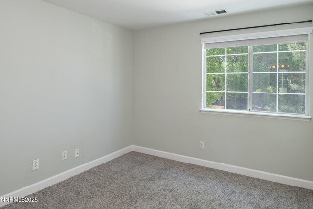4734 Tierrapark Ct, Reno, NV 89502 - unfurnished room featuring carpet and baseboards