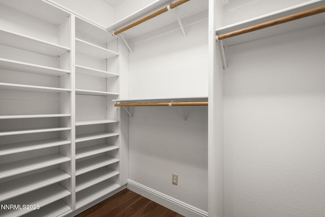 4175 Falling Water Dr, Reno, NV 89519 - spacious closet with dark wood-type flooring