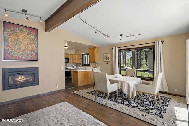 909 Tyner Way, Incline Village, NV 89451 - dining space featuring track lighting, dark wood-style floors, and baseboards