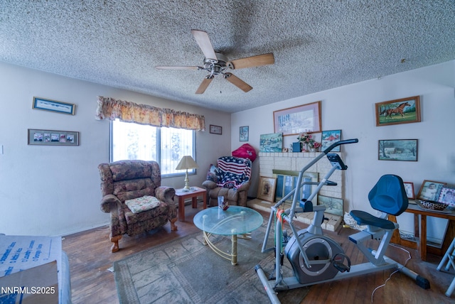 1650 Trabert Way, Sparks, NV 89431 - exercise area featuring hardwood / wood-style floors, a textured ceiling, and a ceiling fan