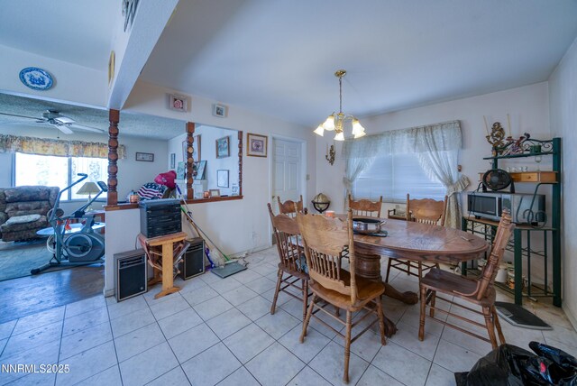1650 Trabert Way, Sparks, NV 89431 - dining room with ceiling fan, a chandelier, and light tile patterned floors