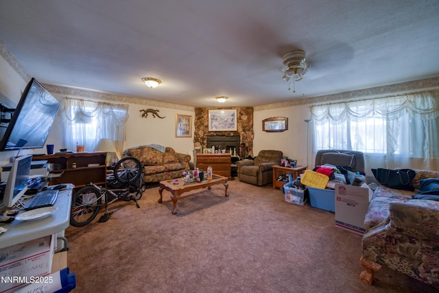 1650 Trabert Way, Sparks, NV 89431 - living room featuring a ceiling fan, carpet, and a fireplace