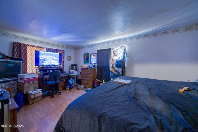 1650 Trabert Way, Sparks, NV 89431 - bedroom featuring wood finished floors and a desk