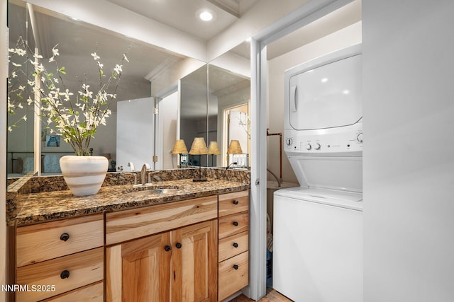 136 Juanita Dr Unit 53, Incline Village, NV 89451 - bathroom with stacked washer / dryer and vanity
