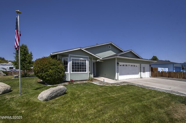 763 Canary Cir, Fernley, NV 89408 - ranch-style home with a garage and concrete driveway