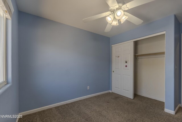 763 Canary Cir, Fernley, NV 89408 - unfurnished bedroom with carpet floors, baseboards, a closet, and a ceiling fan