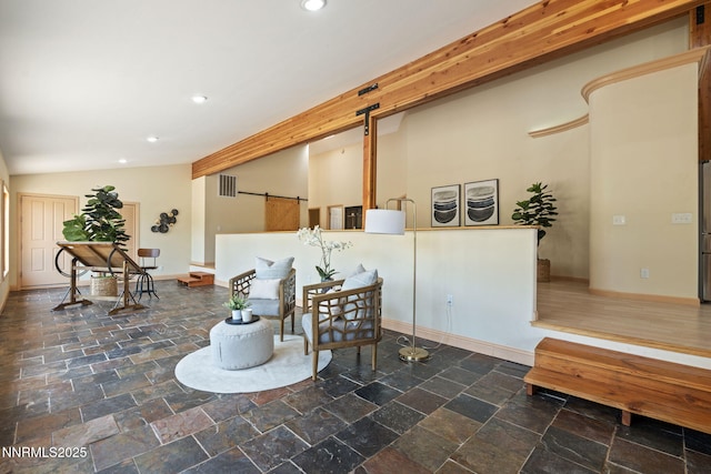 105 Rodeo Dr, Reno, NV 89508 - sitting room featuring a barn door, recessed lighting, stone tile flooring, vaulted ceiling, and baseboards