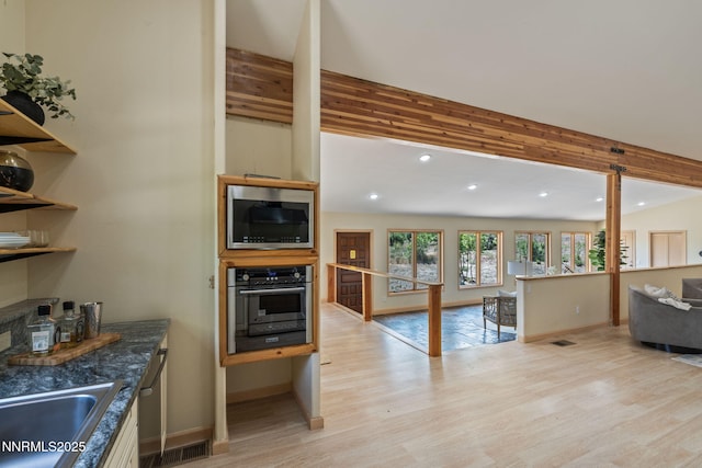 105 Rodeo Dr, Reno, NV 89508 - kitchen featuring stainless steel appliances, recessed lighting, light wood-style floors, baseboards, and open floor plan