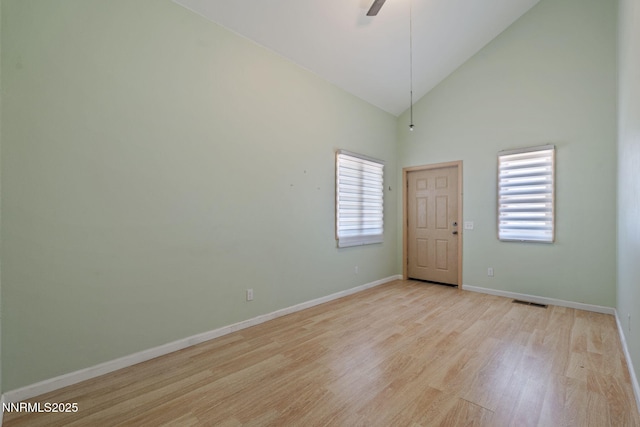 105 Rodeo Dr, Reno, NV 89508 - unfurnished room featuring light wood-style floors, ceiling fan, baseboards, and high vaulted ceiling