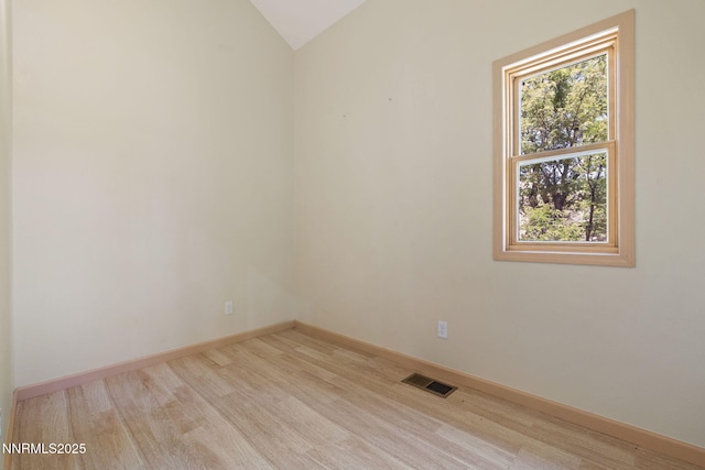 105 Rodeo Dr, Reno, NV 89508 - spare room with lofted ceiling, wood finished floors, and baseboards