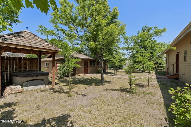 105 Rodeo Dr, Reno, NV 89508 - view of yard featuring a gazebo, entry steps, and a hot tub