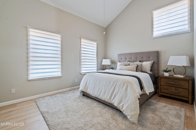 105 Rodeo Dr, Reno, NV 89508 - bedroom featuring wood finished floors, vaulted ceiling, and baseboards