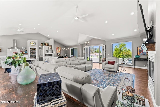 346 Wolf Run Ct, Reno, NV 89511 - living room featuring ceiling fan, vaulted ceiling, wood finished floors, a chandelier, and recessed lighting