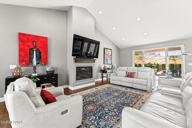 346 Wolf Run Ct, Reno, NV 89511 - living area with wood finished floors, baseboards, recessed lighting, high vaulted ceiling, and a glass covered fireplace