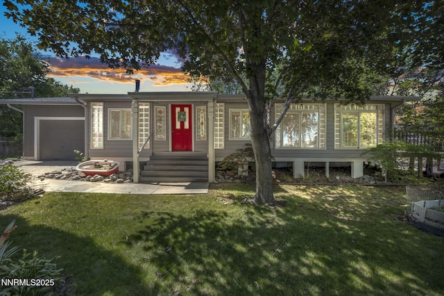 15333 Kivett Ln, Reno, NV 89521 - ranch-style house featuring an attached garage and a yard