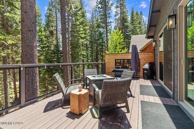 1877 Normuk St, South Lake Tahoe, CA 96150 - deck with an outdoor fire pit