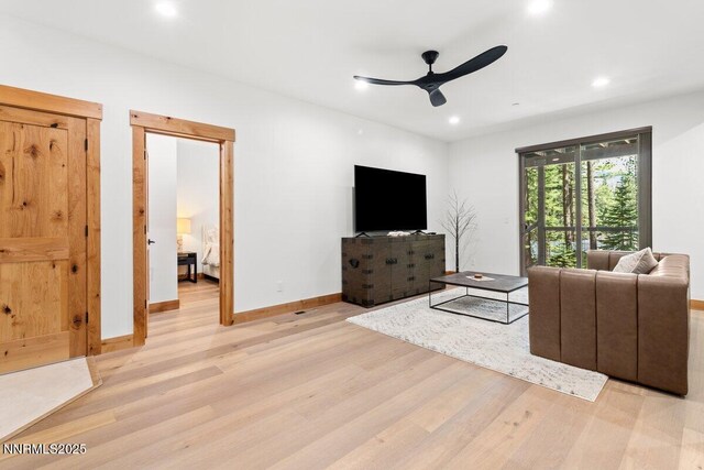 1877 Normuk St, South Lake Tahoe, CA 96150 - living room featuring light wood-type flooring, ceiling fan, recessed lighting, and baseboards