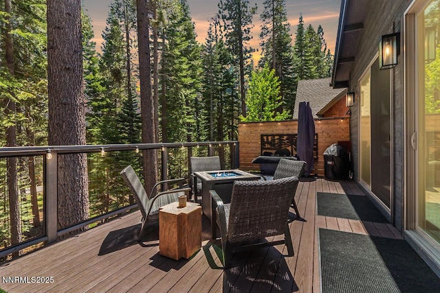 1877 Normuk St, South Lake Tahoe, CA 96150 - wooden deck with an outdoor fire pit