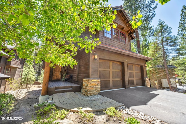 886 Rosewood Cir, Incline Village, NV 89451 - garage featuring asphalt driveway
