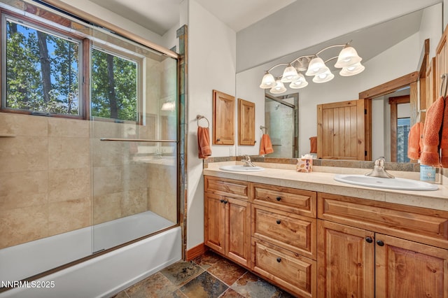 886 Rosewood Cir, Incline Village, NV 89451 - full bath featuring bath / shower combo with glass door, double vanity, stone finish floors, and baseboards