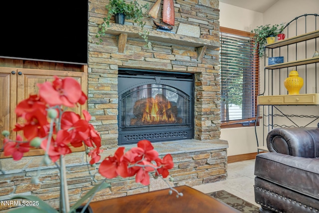 886 Rosewood Cir, Incline Village, NV 89451 - living area featuring baseboards and a stone fireplace