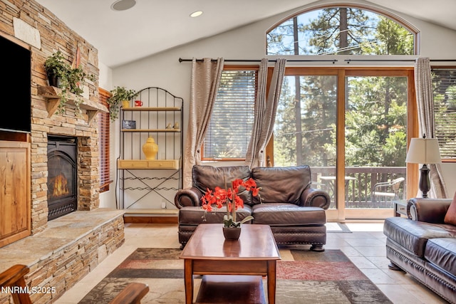 886 Rosewood Cir, Incline Village, NV 89451 - living room with lofted ceiling, a stone fireplace, and recessed lighting