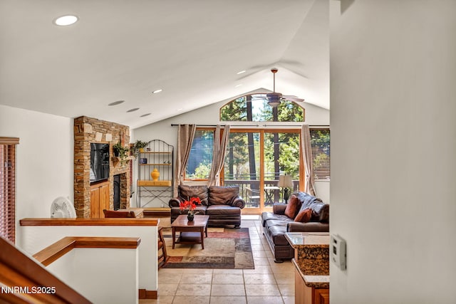 886 Rosewood Cir, Incline Village, NV 89451 - living area with vaulted ceiling, ceiling fan, a stone fireplace, light tile patterned flooring, and recessed lighting