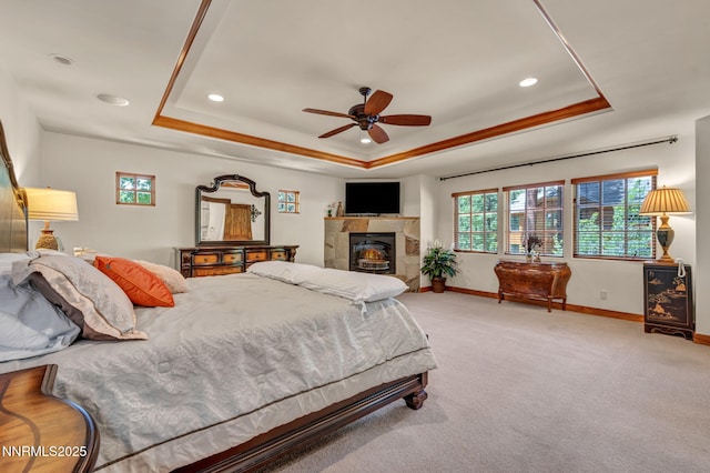 886 Rosewood Cir, Incline Village, NV 89451 - bedroom with a raised ceiling, baseboards, carpet flooring, a tile fireplace, and recessed lighting