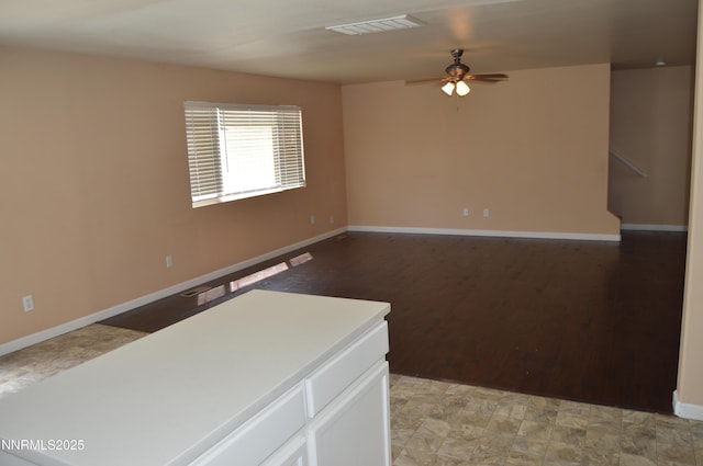 7890 Key Largo Dr, Reno, NV 89506 - empty room with a ceiling fan, baseboards, and light wood-type flooring