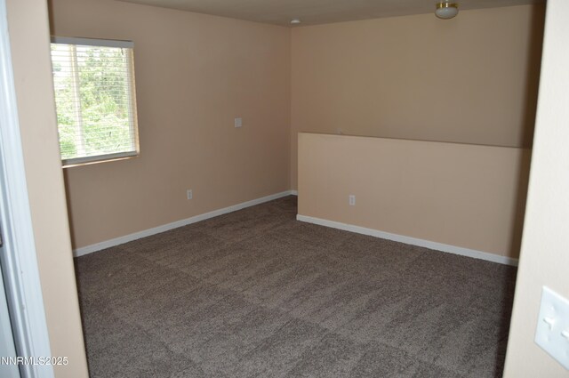 7890 Key Largo Dr, Reno, NV 89506 - spare room featuring carpet flooring and baseboards