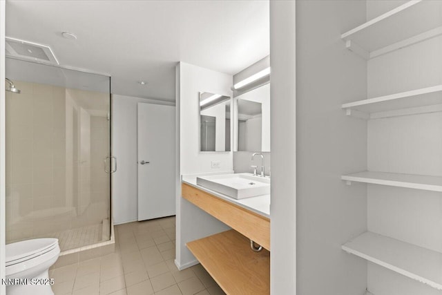 255 N Sierra St Unit 1709, Reno, NV 89501 - full bath featuring a shower stall, vanity, and tile patterned floors