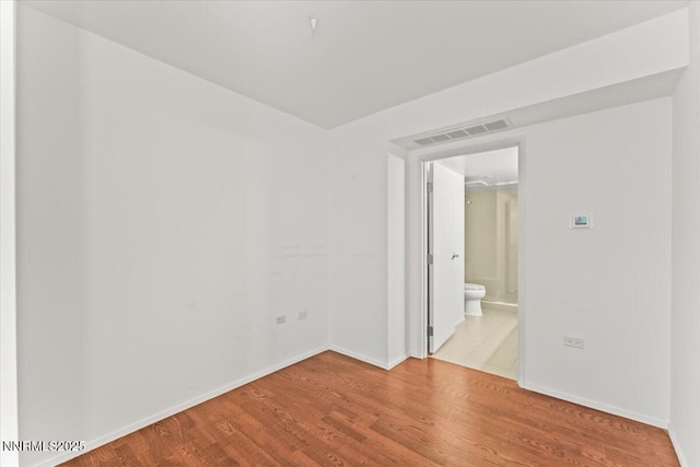 255 N Sierra St Unit 1709, Reno, NV 89501 - unfurnished room featuring baseboards and wood finished floors
