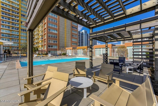 255 N Sierra St Unit 1709, Reno, NV 89501 - community pool with a pergola, a patio area, and a view of city