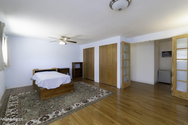 4879 Idlewild Dr, Reno, NV 89519 - bedroom with multiple closets and wood finished floors