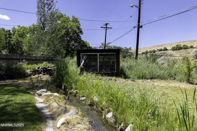 4879 Idlewild Dr, Reno, NV 89519 - view of yard with an outbuilding