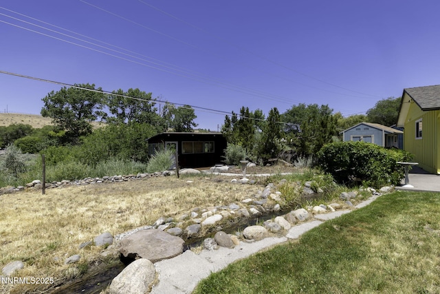 4879 Idlewild Dr, Reno, NV 89519 - view of yard with an outdoor structure
