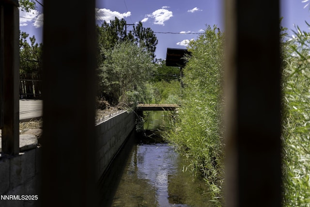 4879 Idlewild Dr, Reno, NV 89519 - view of property exterior with a water view