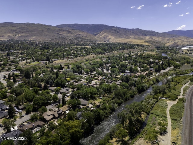 4879 Idlewild Dr, Reno, NV 89519 - aerial view of property and surrounding area featuring mountains and a tree filled landscape