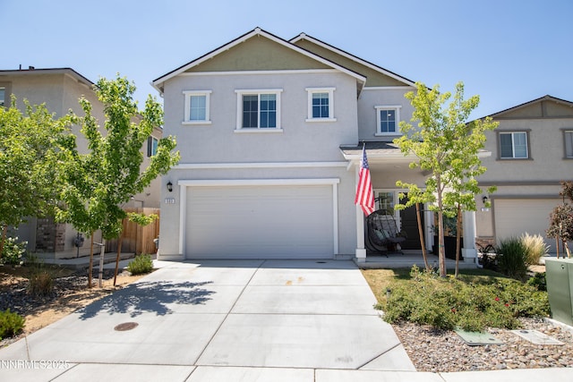 503 Astraea Trl, Reno, NV 89506 - traditional-style home featuring concrete driveway, a garage, and stucco siding
