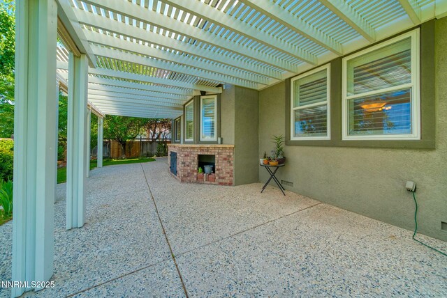 6978 Poco Bueno Cir, Sparks, NV 89436 - view of patio / terrace featuring a pergola and an outdoor brick fireplace