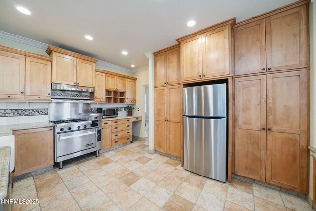 6978 Poco Bueno Cir, Sparks, NV 89436 - kitchen with appliances with stainless steel finishes, ornamental molding, recessed lighting, light stone finish floors, and decorative backsplash