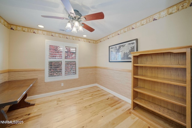 6978 Poco Bueno Cir, Sparks, NV 89436 - unfurnished office featuring wainscoting, ceiling fan, wood finished floors, recessed lighting, and baseboards