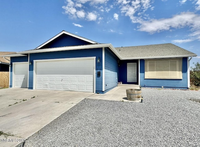 602 Tamsen Rd, Fernley, NV 89408 - ranch-style home with an attached garage and concrete driveway