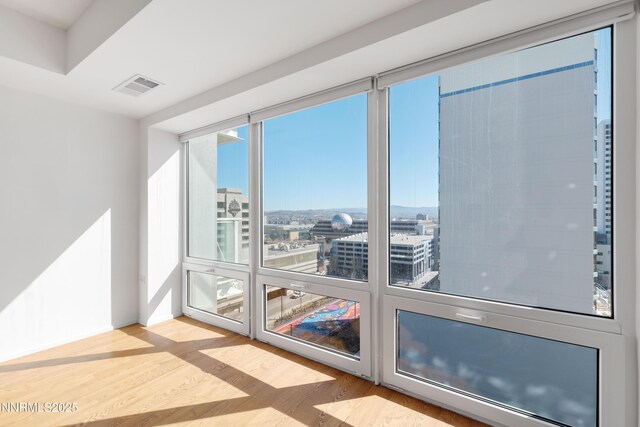 255 N Sierra St Unit 1210, Reno, NV 89501 - empty room with wood finished floors and a city view