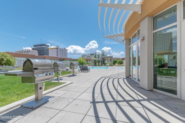 255 N Sierra St Unit 1210, Reno, NV 89501 - view of patio with a grill