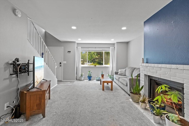 423 Barclay Ct, Reno, NV 89511 - living room featuring carpet flooring, stairway, a fireplace, and recessed lighting