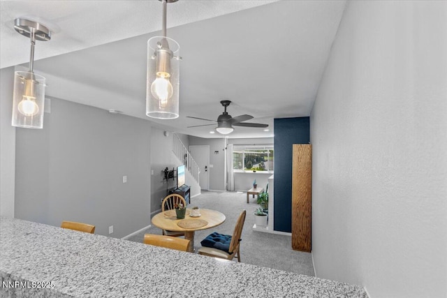 423 Barclay Ct, Reno, NV 89511 - kitchen featuring carpet floors, ceiling fan, and hanging light fixtures