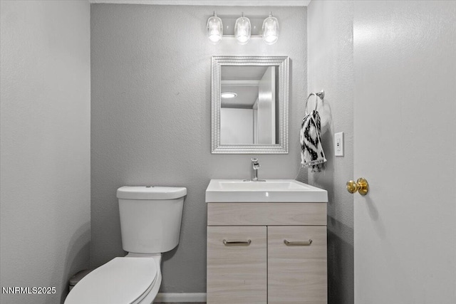 423 Barclay Ct, Reno, NV 89511 - half bath featuring vanity and toilet