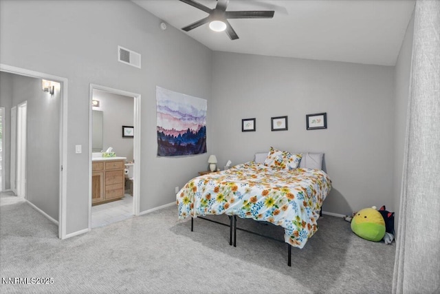 423 Barclay Ct, Reno, NV 89511 - bedroom with carpet, high vaulted ceiling, baseboards, ceiling fan, and ensuite bathroom